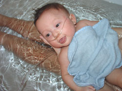 [2005.2.19HollyFirstBathwithMommy.jpg]