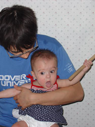 [2005.07.23EdenFirstDrumLessonTongue.jpg]