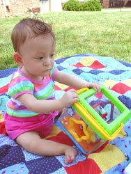 [2005.08.02HollandSittingPlaying.jpg]