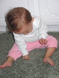 [2005.09.13HollandPlayingwithRug.jpg]