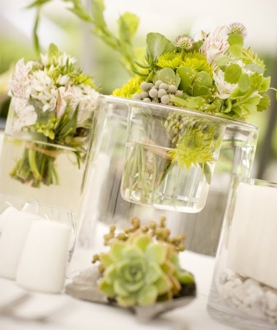 The lovely floral table centerpiece in the same green and white unusual