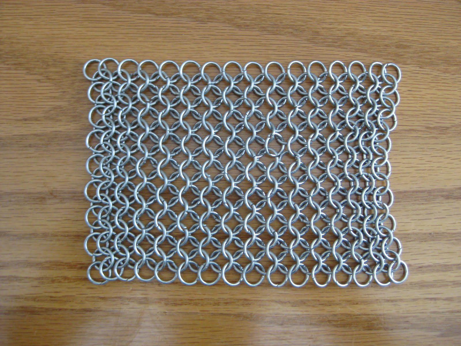 Just finished the crest on a chainmaille shirt I'm building. : r/batman