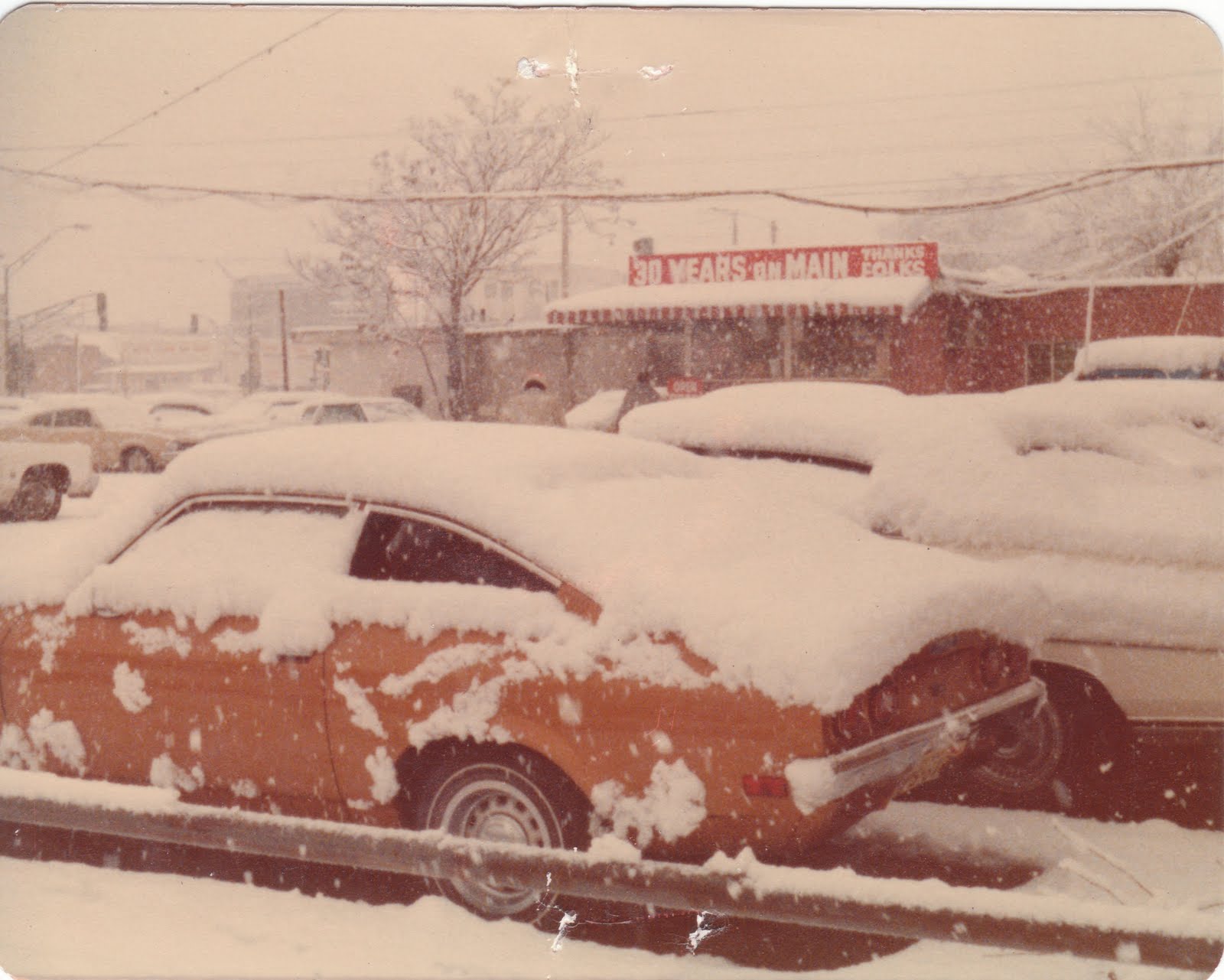 Old Ford pick up on the lot of Buster Lyon Auto Co. in 1975 New Car Concept