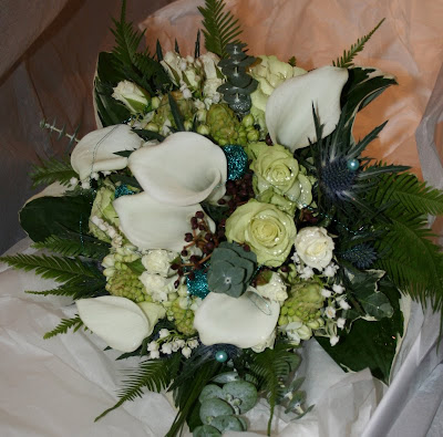 I love this teal wedding bouquet Teal wedding flowers are quite problematic