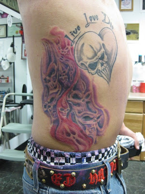 dragon tattoos on ribs. Skulls tattoo on ribs
