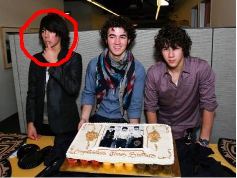joe jonas wants more cake or maybe his mommy awwww!!!!!!!