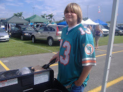 Jimmy grilling brats before Dolphins game