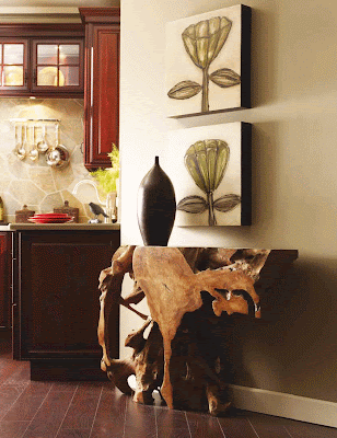 The 2010 catalog from The Phillips Collection features the teak wood console from the Origins collection. It is featured on the Gift & Home Today blog for designers, retailers and wholesalers. giftandhometoday.blogspot.com