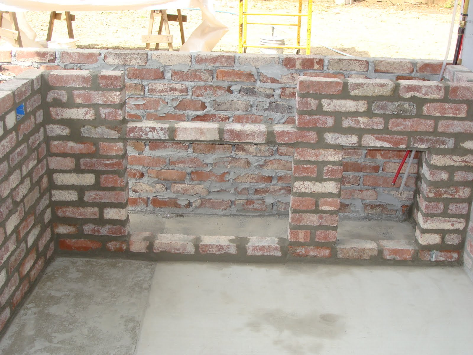 The Ross' Painted brick, outdoor kitchen, backdoor...YEAH!