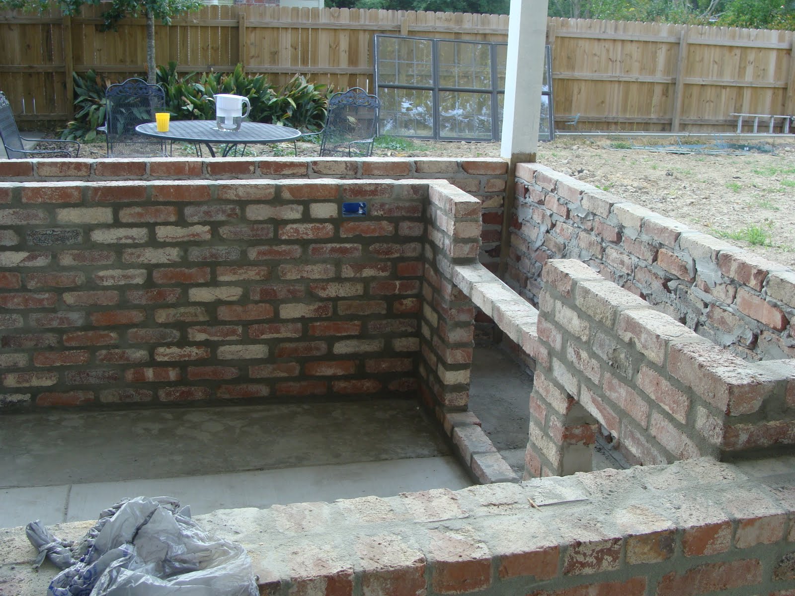 The Ross' Painted brick, outdoor kitchen, backdoor...YEAH!