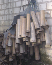 Bumbung bambu untuk menampung nira siwalan