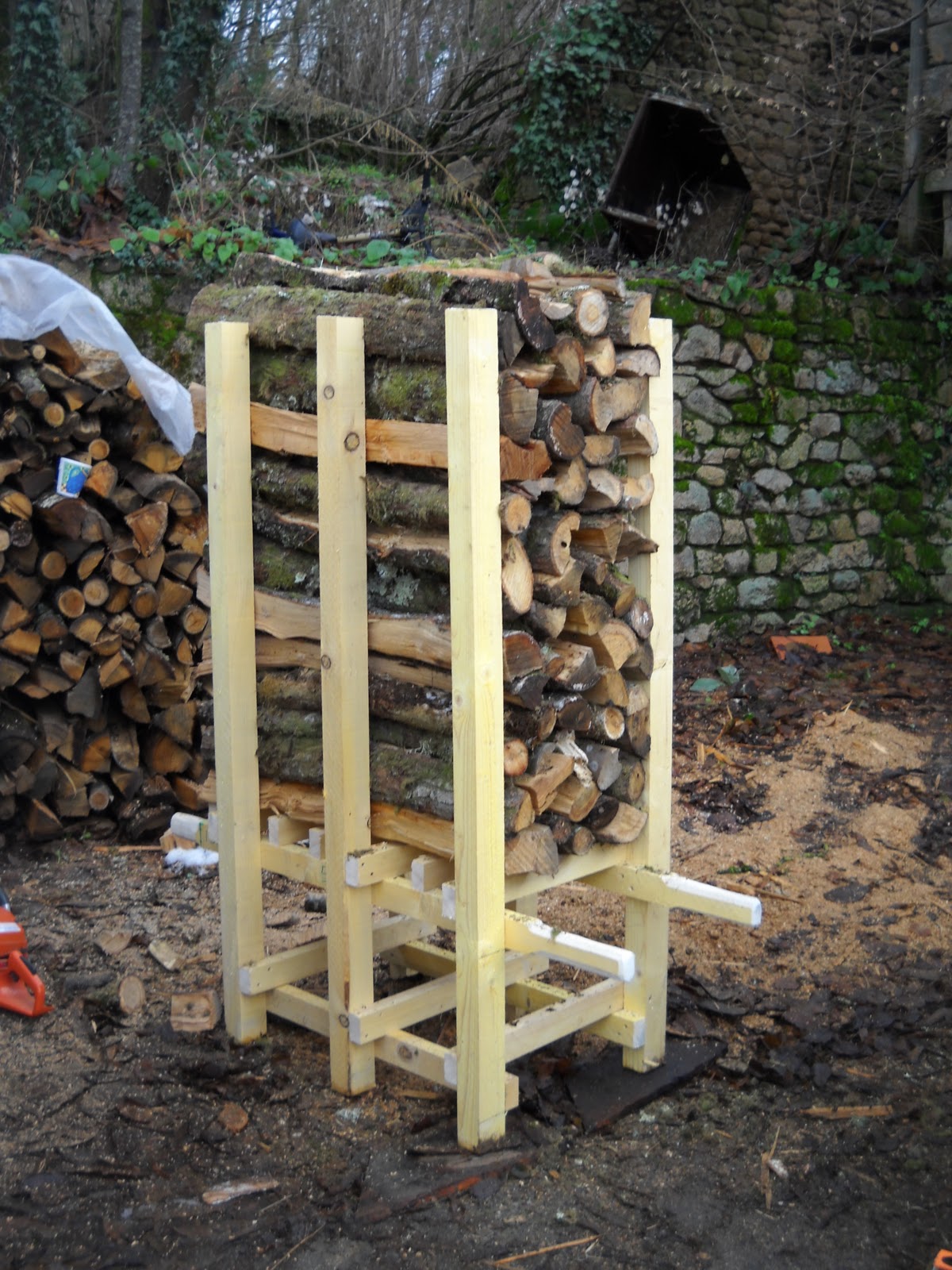 The logs are packed as solidly as possible into the frame which