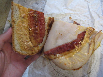 Jack in the Box Turkey, Bacon, & Cheddar Grilled Sandwich inside