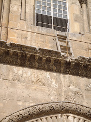 "Infamous ladder" at the entrance of the "Church of the holy Sepulchre"