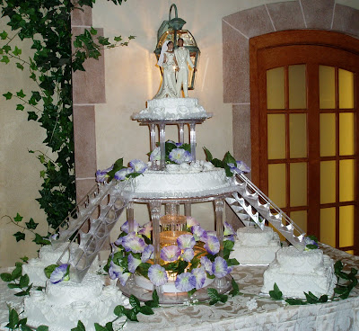 Multi-layered Wedding Cake with Stairs and Fountain