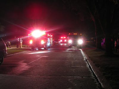 firetrucks on the street, at night, fire, house, firemen