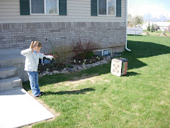 Kelsey shooting her bow, April 2007