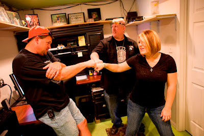 Ron and Amy Shirley and Bobby Brently of Lizard Lick Towing