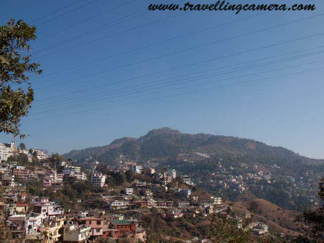 Photo Journey to Solan Town from Himalyan Queen - unedited photographs of Mushroom City of India: Posted by VJ SHARMA at www.travellingcamera.com : Solan is one of the district in Himachal Pradesh having most of the industrial and educational institutions in the State. Solan City comes on the way from Kalka to Shimla and all these photographs have been clicked from moving Himalyan Queen on narrow gauge railway track...Since I started journey from Shimla, the first thing we encounter in Solan in Mohan Mekin's Brewwery which is one of the oldest and reputed brewery in India... Its famous  for Old Monk XXX RUM, Solan No.1 whiskey and Golden Eagle beer...This whole campus belong to Mohan Mekin's Brewery and most of the employees have residences inside..Solan is easily accessible by road as well as train... It is 70 km from Chandigarh (2.5 hrs journey by bus) and 50 kms from Shimla (1.5 hours journey by bus). There are a total of 44 railway tunnels up to Solan...Solan is a beautiful place to live... Its a valley having wonderful weather most of the time in an year... There are many toursit places around Solan like Kasuali, Chail and Barog... Solan itself is a beautiful town with wonderful weather... Its very crowded now and its span is increasing day by day....Chambghat is another main town around Solan, having multiple private companies and some research centers...Solan is known Industrial town... Apart from the well known Baddi, Nalagarh, Barotiwala Industrial areas which belong to Solan District and the well known Mohan Meakin Breweries, Solan town itself is home to many important industries namely, Base terminal Batteries, HFCL (Exicom), Shivalik Bimetal Controls Ltd., Himalyan Pipe Industries and many more. Solan is home to a large number of Pharmaceutical units too...All these photogrpahs have been shot from Himlyan Queen which runs between Shimla and Kalka...