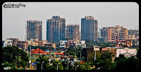 Lot of Real Estate Projects(Residential Appartments) in  Noida : Which one to choose? : Posted by VJ SHARMA on www.travellingcamera.com :This year in 2010, every month many real estate builders are announcing new Projects in Noida... Mainly in Sector 119, 121, 74, 75, 76, 77, 78, 137, 110, 100, 162 etc .... For last four months I have been seraching for a good option for me but after talking to lot dealers decision becomes more difficult... During my visists to all these places, I had clicked some photographs of new projects in Noida.. Here are some of the photographs of Real Estate Projects in Noida....This is a view of Sector-50 which is very well developed today and there are some projects still progressing on one side of it... This is a view of Oxame Twin Towers, Mahagun's new project in sector-50 and some other projects on the back side... Mostof them will be ready for posession by end of 2011... but no one can assure...Apart from core noida, there are many projects going on in Noida extention which is Greater-noida... and beyond Pari chowk....Here is a view of some of the projects in secto-50 which have already been dilivered to buyers... There are some very good aparatments in Sector-50 but some of them have very bad location...Noida Extension also has lot of projects at comparitively cheaper rates... I am not sure how the booking are going there but rates are appreciating like anything which is not a very good sign in my opinion... When I went to Noida extension, it looked like a fair going on there.. there were lot of stalls and people shouting to bring more customers to their stalls for various projects in Noida Extension area...If you have a set priority for floor and location, decide a particular flat in a partciular tower and go to different dealers with same choice.. Do it for one week and you will find that its available but when you catch any dealer first time, he will say 