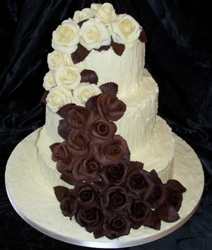 http://3.bp.blogspot.com/_YRHyDLnGwC4/SWQJh1t94qI/AAAAAAAAAuI/s2qGbxPku3s/s400/wedding-cake-white-chocolate-choc-roses-cascade.jpg