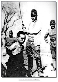 beheading chinese man with sword