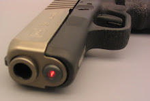 The Lasermax pulsating laser sighting unit simply replaces the Glock’s guide rod-spring assembly.
