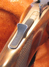 Krieghoff’s combination safety/cocking device looks and operates like a normal safety