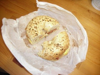 bacon, egg and cheese on an onion bagel