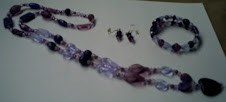 purple set of jewellery