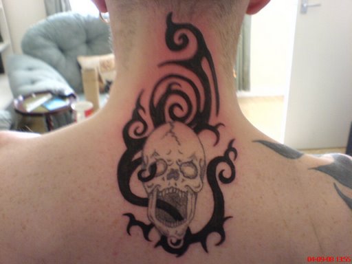 Skull Tattoos Tribal. hot tribal neck tattoos Neck