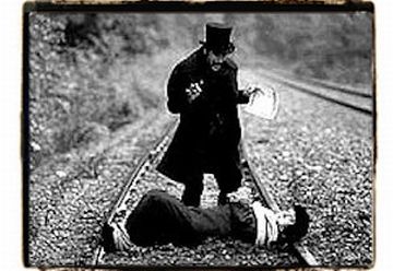 [PerilsOfPaulineTiedToRailwayTracks.jpg]