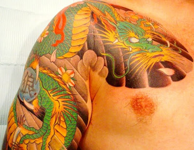 Dragon Tattoo Calf. at Rising Dragon Tattoos.