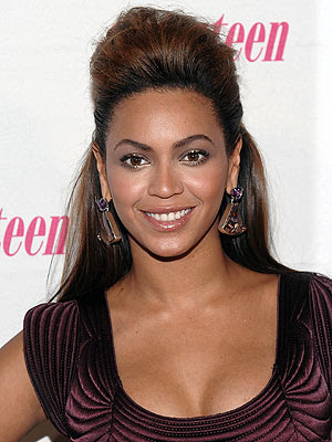 rihanna's pompadour hairstyle. beyonce's pompadour hairstyle