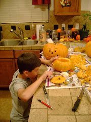 This was the first year that Logan was allowed to actually hold and carve with a knife...
