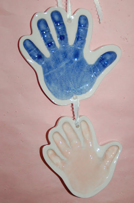 cut out hands (aegean blue, tearose)