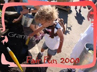 small boy planting seeds at Minnesota state fair image