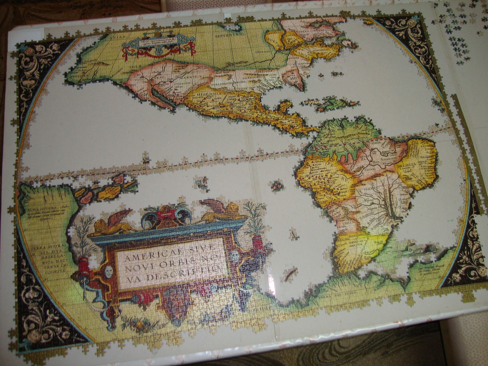 Ravensburger 18,000 puzzle done by 3 kids Day 17