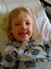 Em in her hospital bed