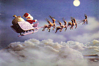 Santa Claus on his sleigh Wallpaper