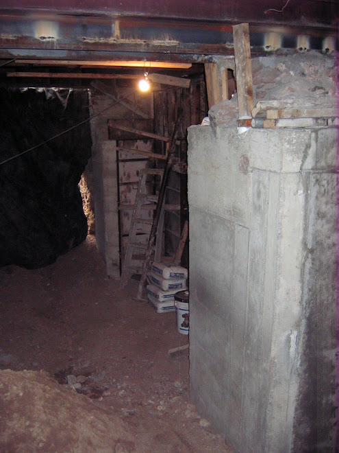12/07 a section of new concrete foundation/ wall that supports our home