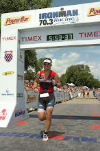Tracy Butler finishing Ironman 70.3 Racine