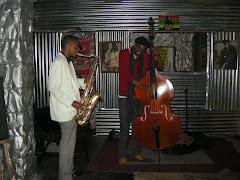 Mngomezulu Neku (bass) and Afrika Mahlangu (sax)