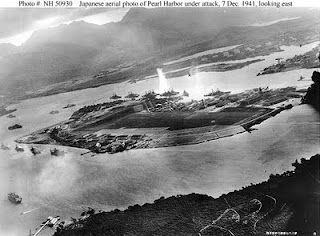 NH 50930 Photograph taken from a Japanese plane during the torpedo attack on ships moored on both sides of Ford Island.