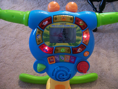 vtech ride and learn giraffe bike