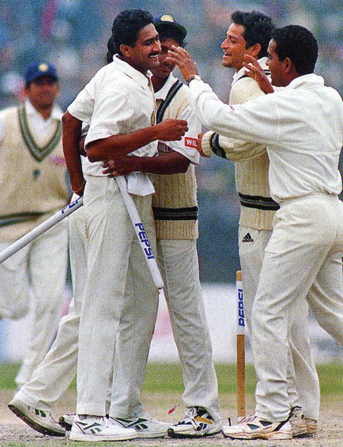 [Kumble's+team-mates+mob+him+after+he+became+only+the+second+bowler+in+history+to+take+all+ten+wickets+in+an+innings-794907.jpg]
