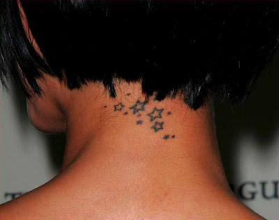 rihanna tattoo pictures. Rihanna Tattoos