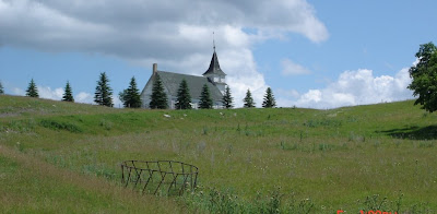 View of St. Peter's on the hill and the road from the Orstad farmhouse below