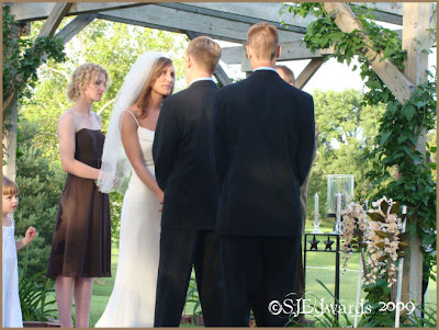 The wedding altar was a wooden structure that had vines growing up along the