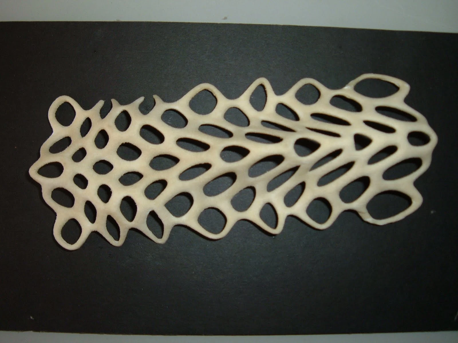 A clear comparative illustration displaying the distinct morphologies of spits, bars, and tombolos with labels and different visual examples.